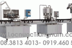 Dầy chuyền súc rửa, chiết rót, đóng nắp chai tự động